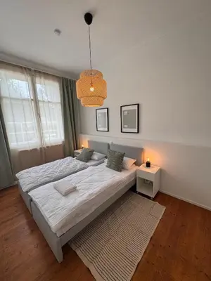 Ein Bett oder Betten in einem Zimmer der Unterkunft Bavaria Home Apartments Geisenfeld