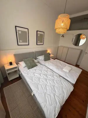 Ein Bett oder Betten in einem Zimmer der Unterkunft Bavaria Home Apartments Geisenfeld
