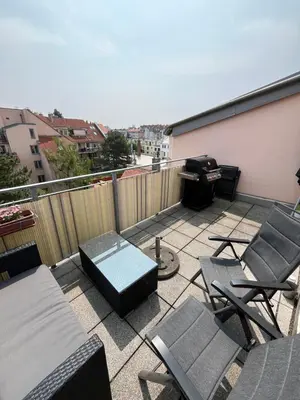 Ein Balkon oder eine Terrasse in der Unterkunft City-Apartment with private Rooftop Terrace