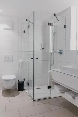 Ein Badezimmer in der Unterkunft Aktiv Hotel am Inn
