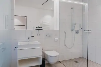 Ein Badezimmer in der Unterkunft Aktiv Hotel am Inn