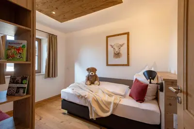 Ein Bett oder Betten in einem Zimmer der Unterkunft Knoglerhof am Rinser See