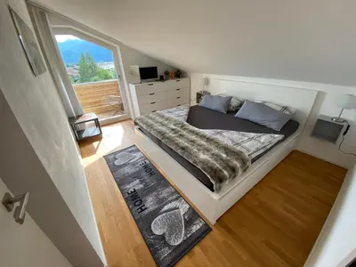 Ein Bett oder Betten in einem Zimmer der Unterkunft 5-Sterne Active Ferienwohnung Chiemgau