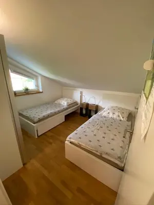 Ein Bett oder Betten in einem Zimmer der Unterkunft 5-Sterne Active Ferienwohnung Chiemgau