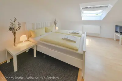 Ein Bett oder Betten in einem Zimmer der Unterkunft Pension Wess