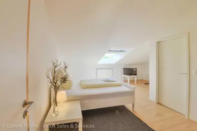 Ein Bett oder Betten in einem Zimmer der Unterkunft Pension Wess