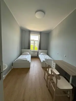 Ein Bett oder Betten in einem Zimmer der Unterkunft 1, 2, sleep Boardinghouse München Hauptbahnhof