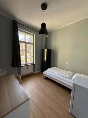 Ein Bett oder Betten in einem Zimmer der Unterkunft 1, 2, sleep Boardinghouse München Hauptbahnhof