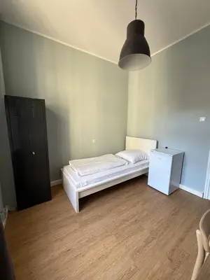 Ein Bett oder Betten in einem Zimmer der Unterkunft 1, 2, sleep Boardinghouse München Hauptbahnhof