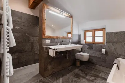 Ein Badezimmer in der Unterkunft Chalet Kreuth I - Private Alpine Cahlet next to Tegernsee for Family & Friends - including Sauna & free parking