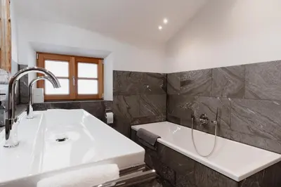 Ein Badezimmer in der Unterkunft Chalet Kreuth I - Private Alpine Cahlet next to Tegernsee for Family & Friends - including Sauna & free parking