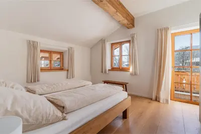 Ein Bett oder Betten in einem Zimmer der Unterkunft Chalet Kreuth I - Private Alpine Cahlet next to Tegernsee for Family & Friends - including Sauna & free parking
