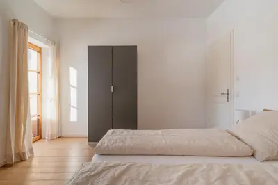 Ein Bett oder Betten in einem Zimmer der Unterkunft Chalet Kreuth I - Private Alpine Cahlet next to Tegernsee for Family & Friends - including Sauna & free parking