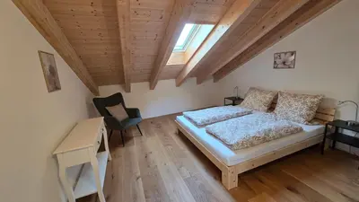 Ein Bett oder Betten in einem Zimmer der Unterkunft Ferienwohnung Lederer