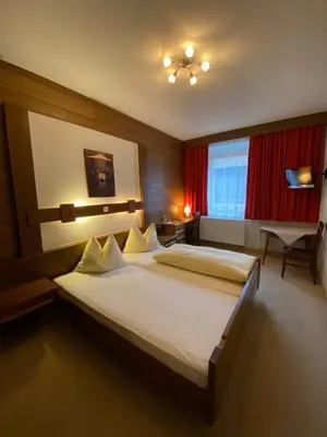 Ein Bett oder Betten in einem Zimmer der Unterkunft Gasthof Großer Wirt