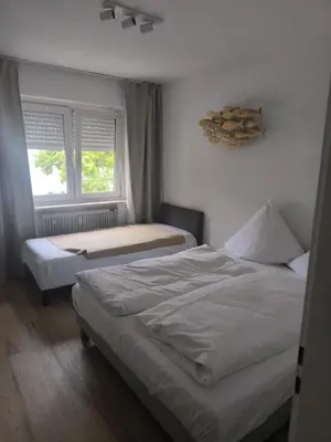 Ein Bett oder Betten in einem Zimmer der Unterkunft Apartment Rosa