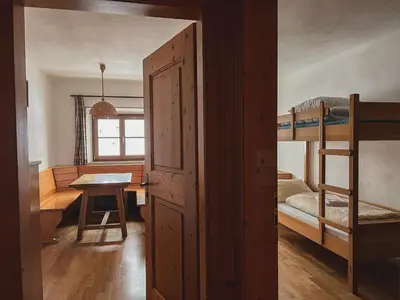 Ein Bett oder Betten in einem Zimmer der Unterkunft Jugendherberge Bayrischzell-Sudelfeld