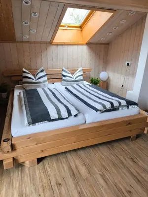 Ein Bett oder Betten in einem Zimmer der Unterkunft Ferienwohnung Claire