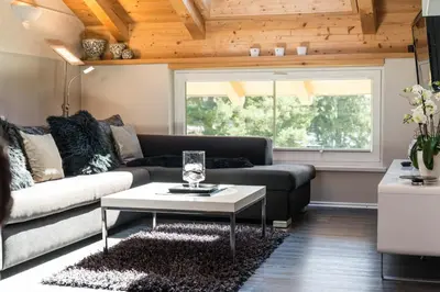 Ein Sitzbereich in der Unterkunft 5 Sterne Ferienwohnung am See