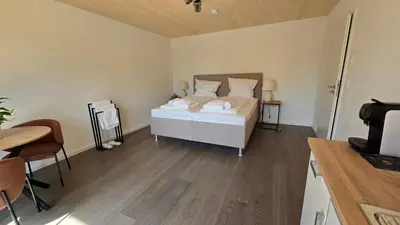 Ein Bett oder Betten in einem Zimmer der Unterkunft Quiet Guest Apartment in Peißenberg