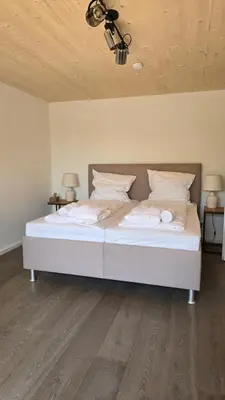 Ein Bett oder Betten in einem Zimmer der Unterkunft Quiet Guest Apartment in Peißenberg