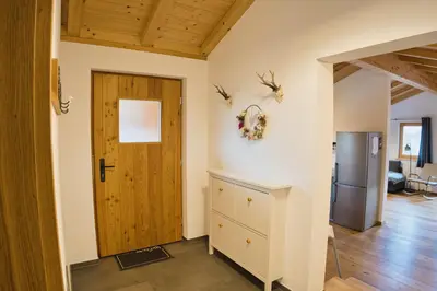 Ein Sitzbereich in der Unterkunft Ferienwohnung Waldzeit