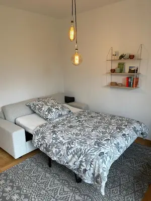 Ein Bett oder Betten in einem Zimmer der Unterkunft Idyllische Wohnung mit Bergblick nah am Simssee