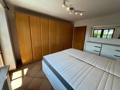 Ein Bett oder Betten in einem Zimmer der Unterkunft Puchheim Apartment
