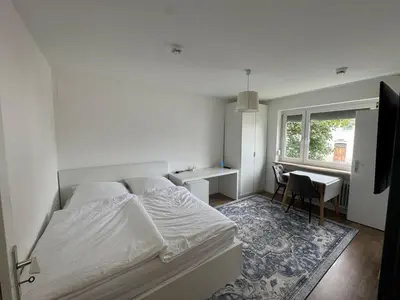 Ein Bett oder Betten in einem Zimmer der Unterkunft Exklusives Studio im Zentrum