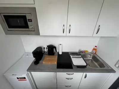 Küche/Küchenzeile in der Unterkunft Exklusives Studio im Zentrum