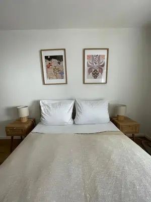 Ein Bett oder Betten in einem Zimmer der Unterkunft NEU - Apartment Lago am Chiemsee