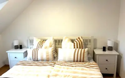 Ein Bett oder Betten in einem Zimmer der Unterkunft Panorama 13