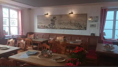 Ein Sitzbereich in der Unterkunft Allgäuer Hof Weilheim