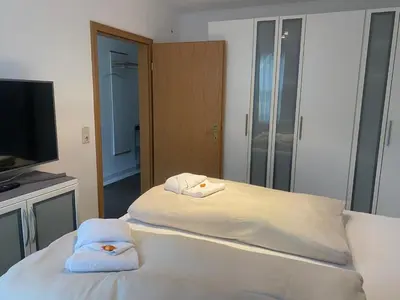 Ein Bett oder Betten in einem Zimmer der Unterkunft Alpenjuwel