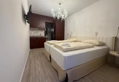Ein Bett oder Betten in einem Zimmer der Unterkunft Boutique-Hotel Goethe