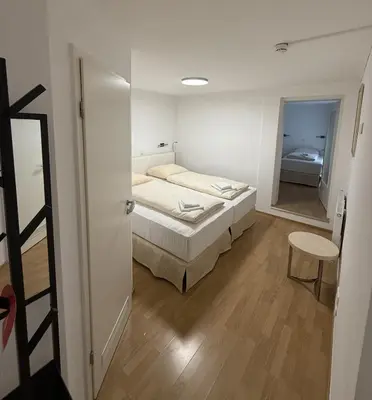 Ein Bett oder Betten in einem Zimmer der Unterkunft Boutique-Hotel Goethe