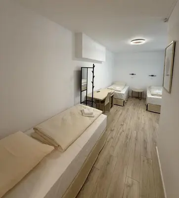 Ein Bett oder Betten in einem Zimmer der Unterkunft Boutique-Hotel Goethe