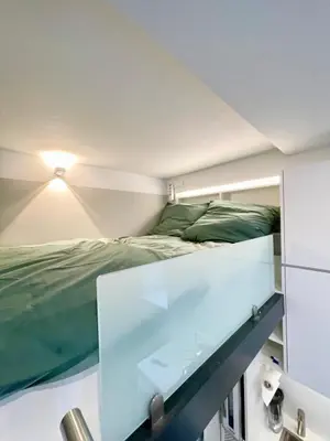 Ein Bett oder Betten in einem Zimmer der Unterkunft Voll ausgestattetes Apartment in der Au