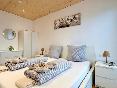 Ein Bett oder Betten in einem Zimmer der Unterkunft Chalet du calme Gersthofen