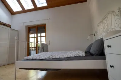 Ein Bett oder Betten in einem Zimmer der Unterkunft Ferienhaus Fischermartl am Ammersee