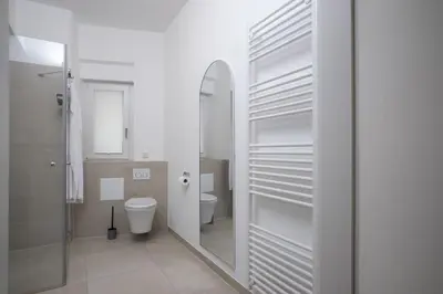 Ein Badezimmer in der Unterkunft Brand new luxury apartment on Rathausplatz