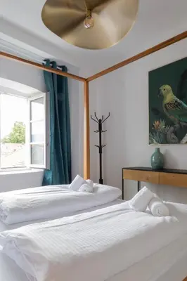 Ein Bett oder Betten in einem Zimmer der Unterkunft ღLiboria I Casa Mangifera