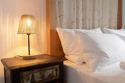 Ein Bett oder Betten in einem Zimmer der Unterkunft ღLiboria I Casa Mangifera
