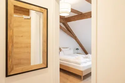 Ein Bett oder Betten in einem Zimmer der Unterkunft ღLiboria Das Blaue Haus