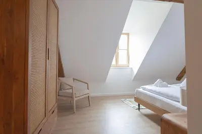 Ein Bett oder Betten in einem Zimmer der Unterkunft ღLiboria Casa Mondo