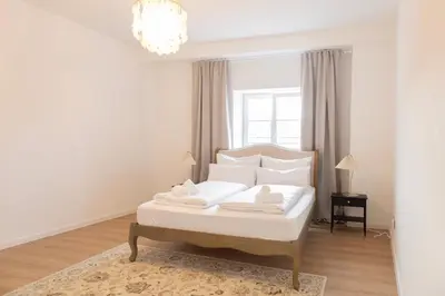 Ein Bett oder Betten in einem Zimmer der Unterkunft ღLiboria Villa Münter