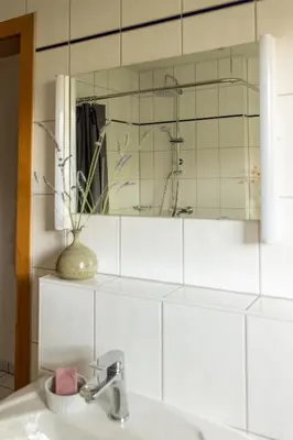 Ein Badezimmer in der Unterkunft FeWoLo