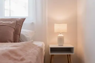 Ein Bett oder Betten in einem Zimmer der Unterkunft Bay 47° Boutique Apartments am Chiemsee
