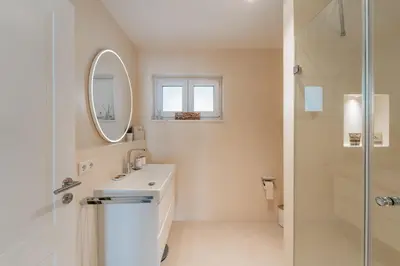 Ein Badezimmer in der Unterkunft Bay 47° Boutique Apartments am Chiemsee
