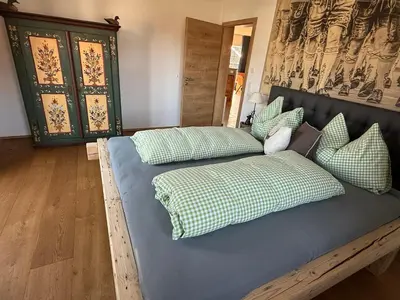 Ein Bett oder Betten in einem Zimmer der Unterkunft Wohnung Kirchstein Highlight Fliegenfischen auf der Isar